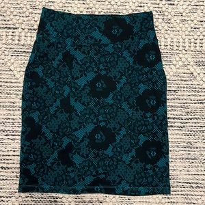 Divided Pencil Skirt. Color: Black/Teal. Size:4.
